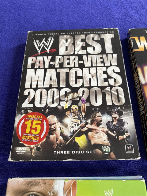 WWE Wrestling DVD Lot of 4 - Wrestlemania, Rey Mysterio, Royal Rumble 2009-2010