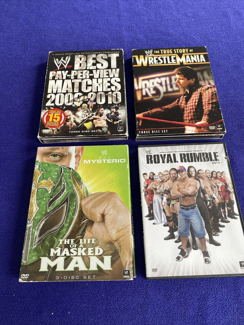 WWE Wrestling DVD Lot of 4 - Wrestlemania, Rey Mysterio, Royal Rumble 2009-2010